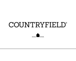 Slaapkamer met landelijke stijl en comfortabele bedden op een boerderij.